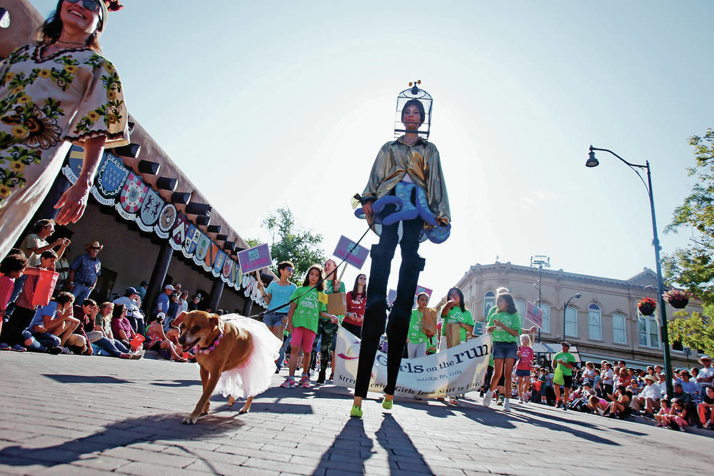 Furry friends filing through downtown Santa Fe
